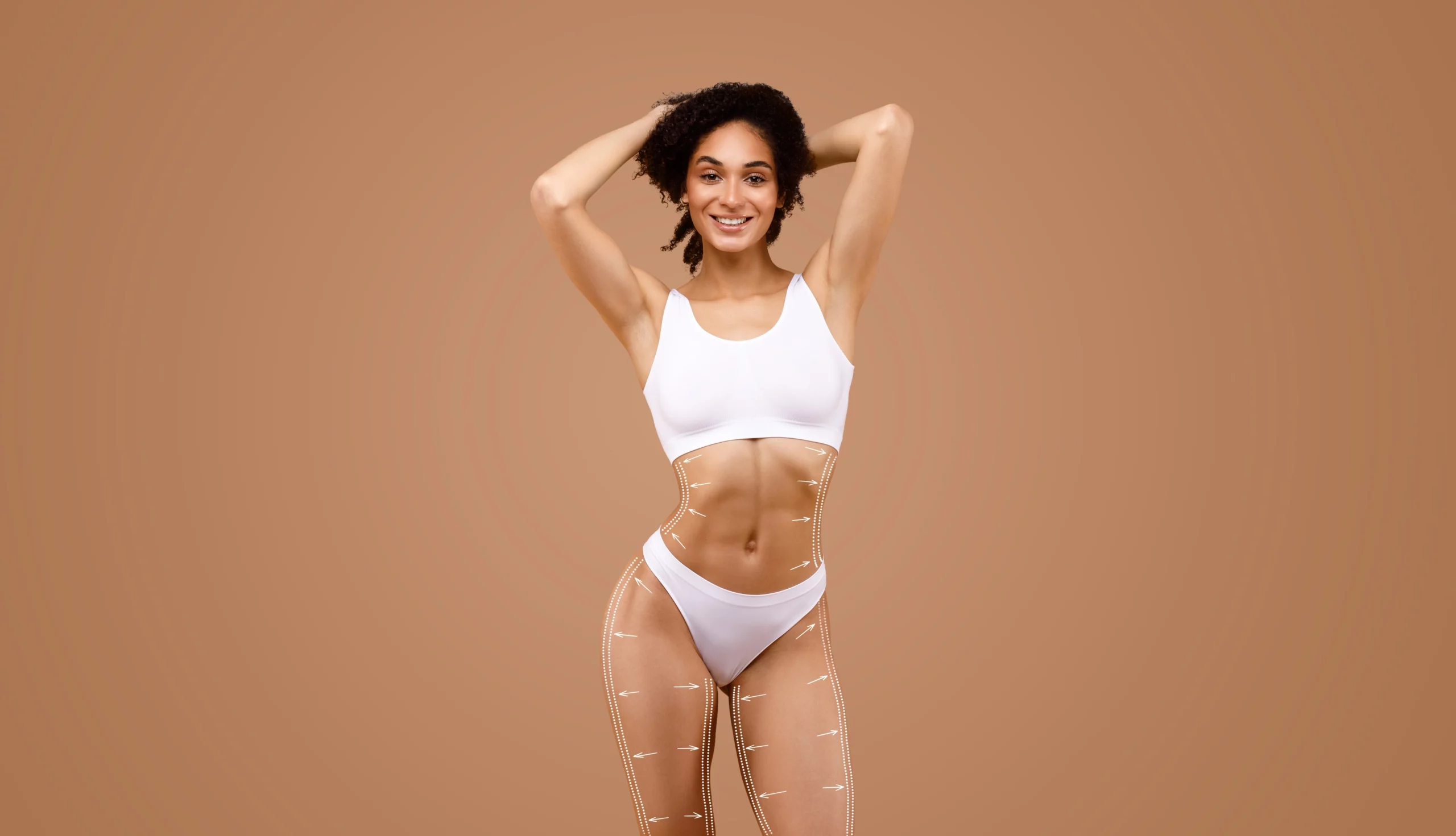 A woman standing after the Body Contouring in Draper, UT