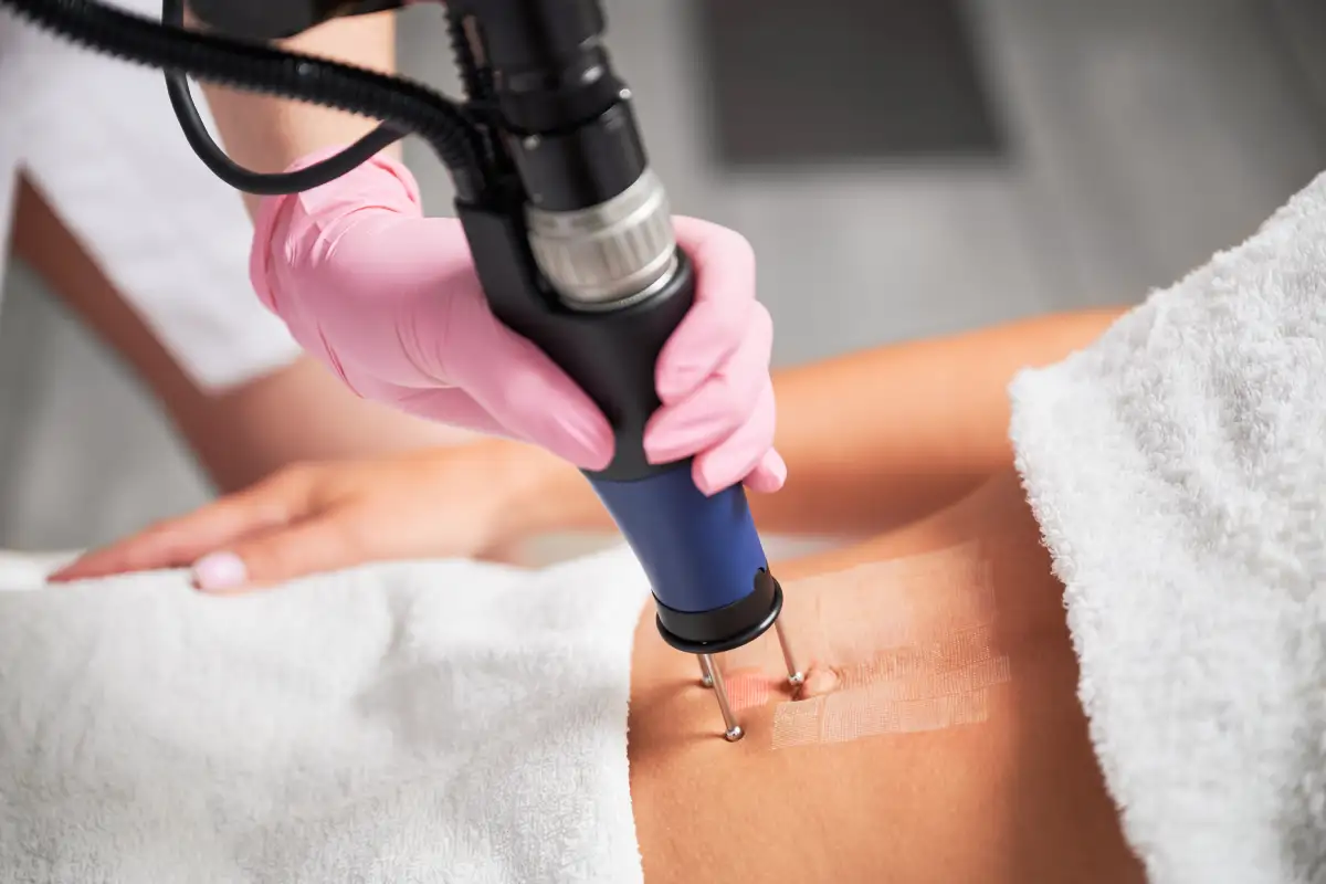 Woman take laser treatment with Moderne Airbrush Laser in Draper, UT at Femme Moderne Center for Aesthetics