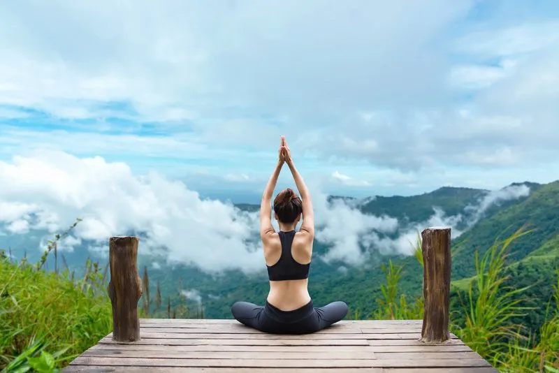 A women doing yoga | Femme Moderne Center for Aesthetics in Draper, UT